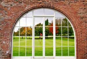 Window frame with view to golf field